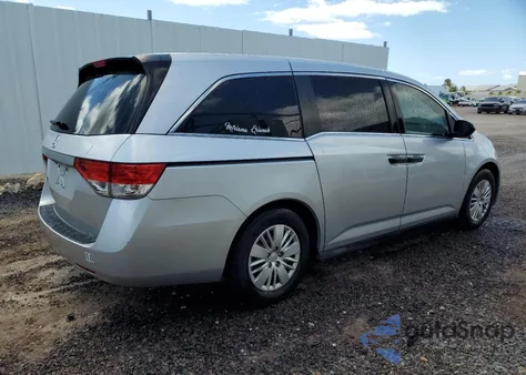 2014 Honda Odyssey Lx z USA, uszkodzony, nr VIN 5FNRL5H22EB118996
